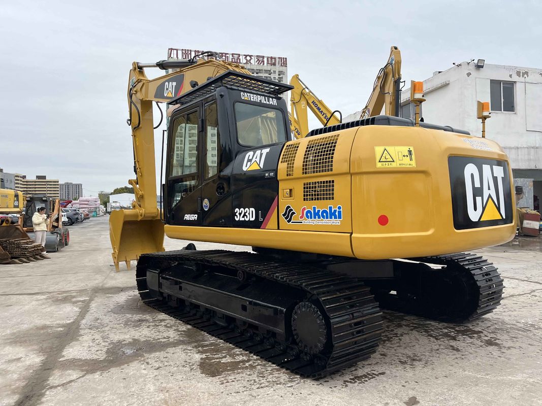 Escavatori a trasloco CAT 323DL usati per la costruzione