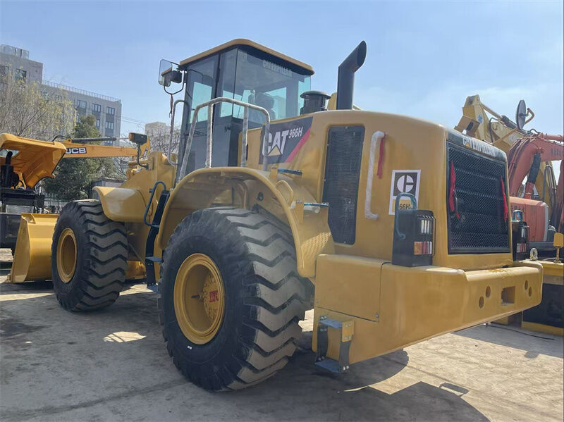 Paleatrice gommata CAT 966H usata con motore Weichai, peso operativo di 23698 kg e capacità benna di 4,0 m3