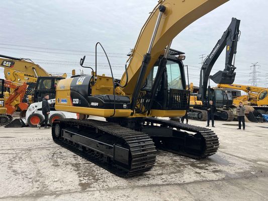 Escavatori a trasloco CAT 323DL usati per la costruzione